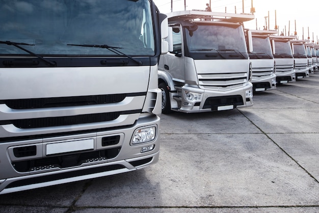 group-trucks-parked-row_342744-533
